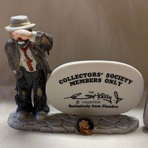Emmett Kelly Jr. porcelain bisque from Flambro. Includes pin and tin of notes.